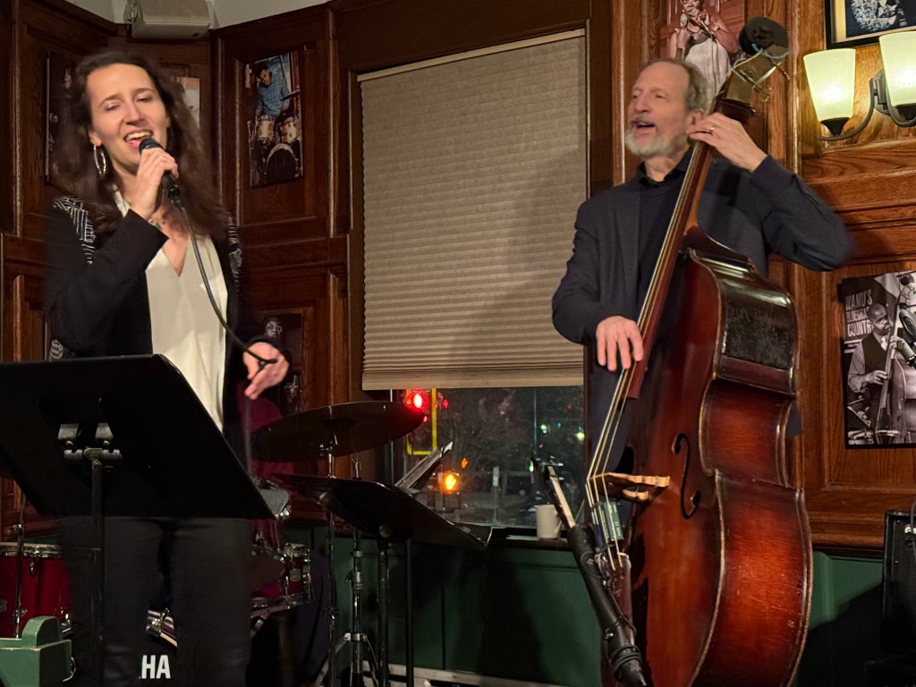 Lanah singing and David Jernigan playing bass